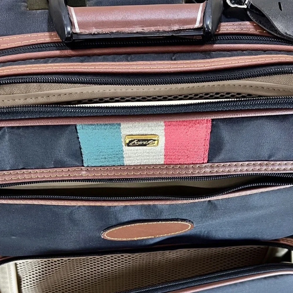 Luxurious Black and Brown Travel Bag with Multicolor Accents